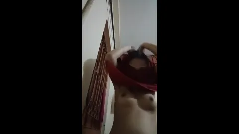 Cute innocent girl recording nudes shows boobs